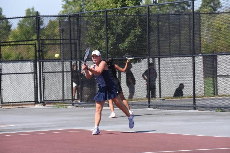 Ottawa-Glandorf's Maggie Schmiedebusch returns a shot during tournament action at the UNOH Courts. Schmiedebusch won the Division II sectional tennis tournament title to advance to the district tournament.