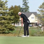 Kalida's Paul Stechschulte watches a putt roll towards the cup on the ninth hole during the Division III district tournament Thursday. Stechschulte finished with a 77 to help the Wildcats to the state tournament.